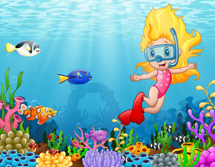 Fototapeta na wymiar Little girl diving in the sea