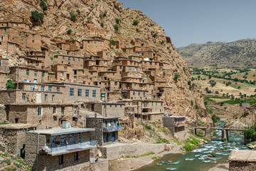 Traditional stone houses in Palangan village, Kurdistan, Iran, nestled in the mountains.
