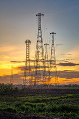 Telecommunication mast television antennas on sunset