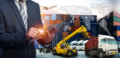Businessman is pressing button on touch screen interface in front Logistics Industrial Container Cargo freight ship for Concept of fast or instant shipping, Online goods orders worldwide