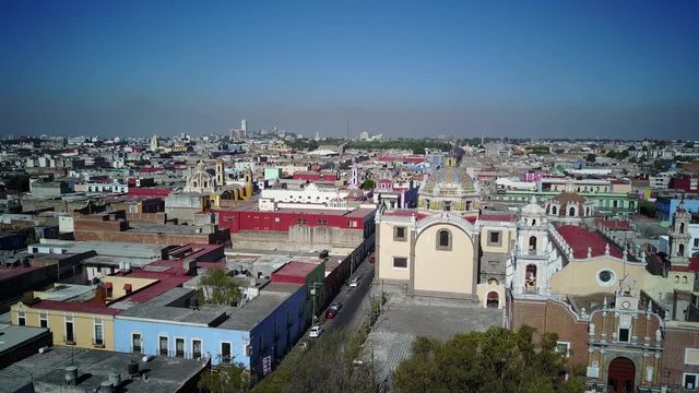 4K Video of morning flying up aerial view cityscape of Cholula, Mexico
