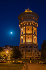 Fototapeta na wymiar Night landscape with water tower in Szeged, Hungary