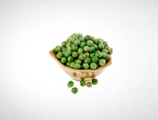 nuts or crispy coated green pea on the background.