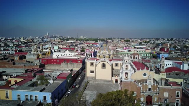 4K Video of morning flying up aerial view cityscape of Cholula, Mexico