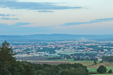 Ceske Budejovice in morning fog with trees in front, Czech landscape