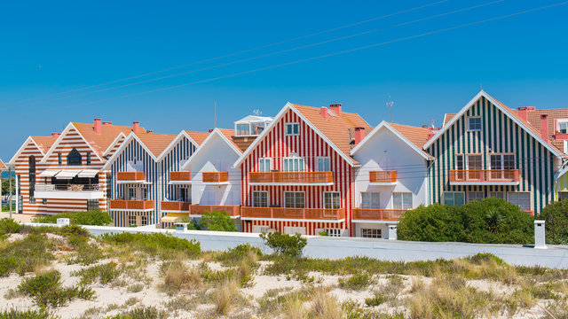 Aveiro in Portugal, Costa Nova, Beira Litoral, colored and lined houses on the beach
