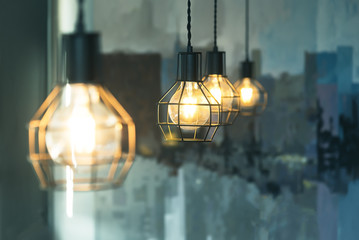 Incandescent lamps in a modern cafe. Edison lamp.