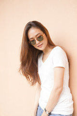 Fashion portrait of young woman wearing a sunglasses  in summer.