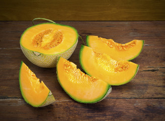 Fresh melon on the wooden table