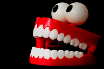 Chattering teeth toy from three quarter with open mouth