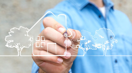 Businessman drawing manuscript real estate plan project