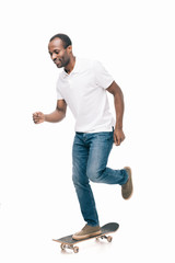 Naklejka premium african american man with skateboard