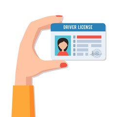 Female hand with driver license