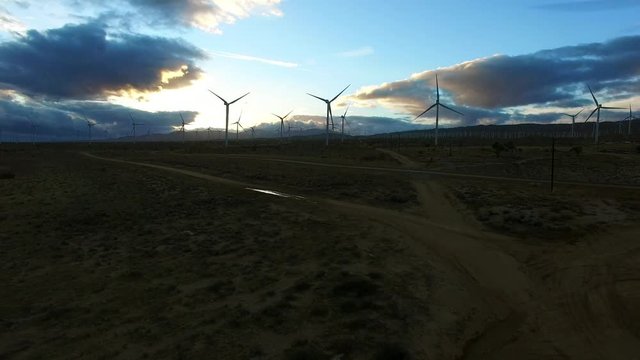 Aerial view of windmills at sunrise