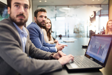 Perspective businesspeople having meeting in conference room