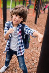 Obraz premium child boxing on playground