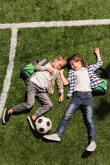 schoolboys with soccer ball