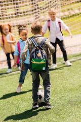 Fototapeta premium schoolchildren playing soccer