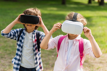 Naklejka premium kids with vr headsets