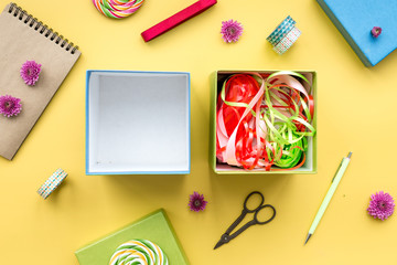 wrapping gifts in box for holiday top view mock up