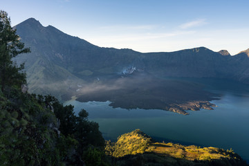 Naklejka na ściany i meble Rinjani active volcano mountain at sunrise, Lombok island, Indonesia