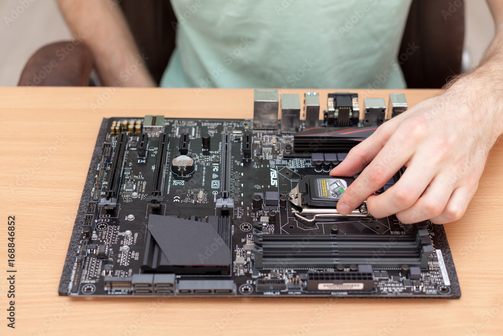 Poster prepearing motherboard for installing the central processor
