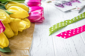 flowers spring tulips on wooden background
