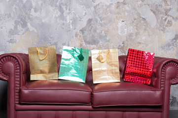 Sofa with colorful present bags