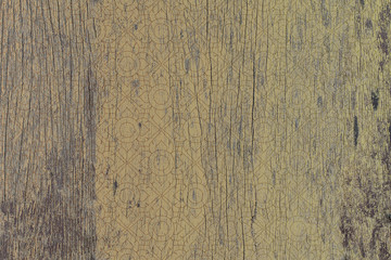 Thai vintage pattern on grunge vintage wooden background with peeling yellow paint