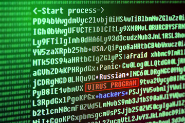 Obraz premium Search for a virus signature in the program code. Russian hackers. Computer virus concept.