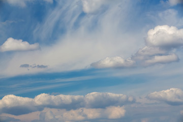 White clouds on evening blue sky
