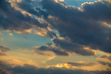 sunset clouds on evening blue sky