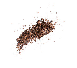 Pile of coffee bean craked powder isolated on white background top view