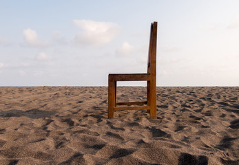 chair at the ocean beach in the afternoon - empty mind - loneliness