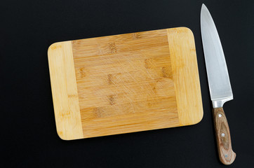 Kitchen utensils: knife and cutting board