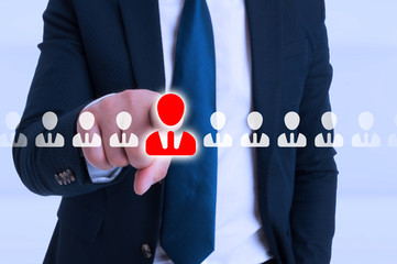 Businessman pointing on contact icon from screen
