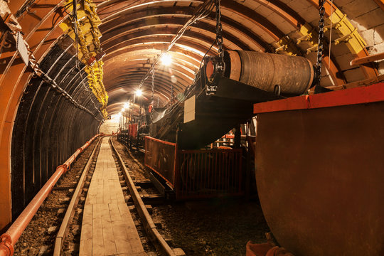 Empty conveyor belt in underground coal mine. Crisis in the mining industry