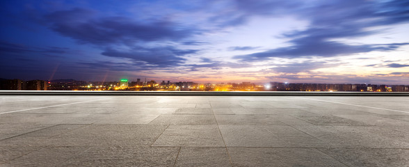 empty floor and cityscape of modern city
