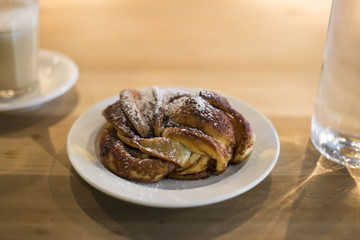 Croissants bakery for morning breakfast meal with coffee and water