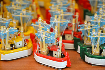 many toy wood boats close up photo