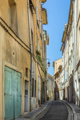 narrow street with facade of old houses in Aix en Provence