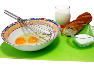 ingredients and tools to make a cake