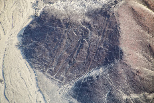 Aerial view of Nazca Lines - Astronaut geoglyph, Peru.