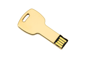Gold colored USB-stick shaped like a key, isolated on white