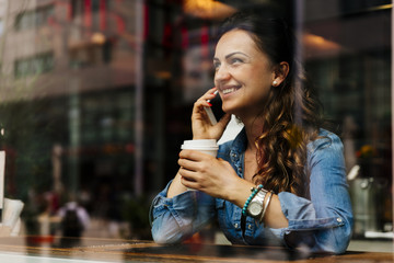 Beautiful woman using her mobile.