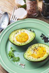 Homemade Organic Egg Baked in Avocado with Salt and Pepper