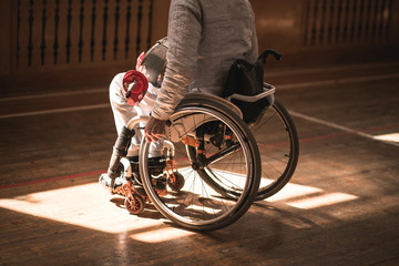 training disabled fencers sitting on a wheelchair