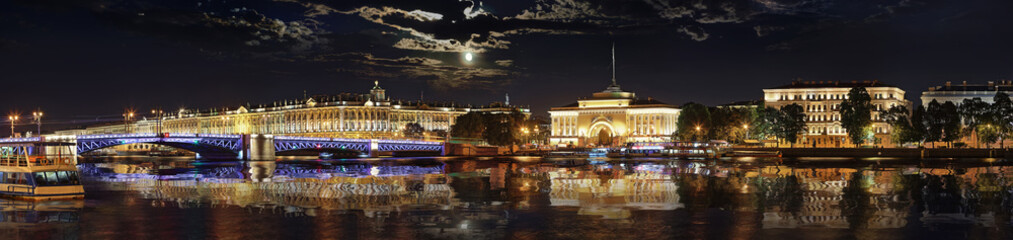 Night panorama of Angliyskaya Embankment and Palace Bridge in St. Petersburg