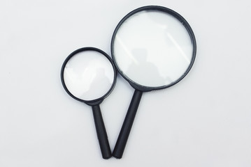 Magnifying Glass Over White Background