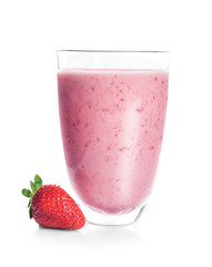 Glass of delicious strawberry yogurt smoothie on white background